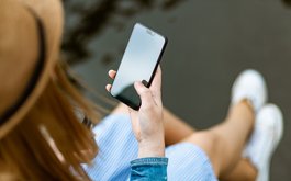 Canva - Person Holding Smartphone White Sitting.jpg